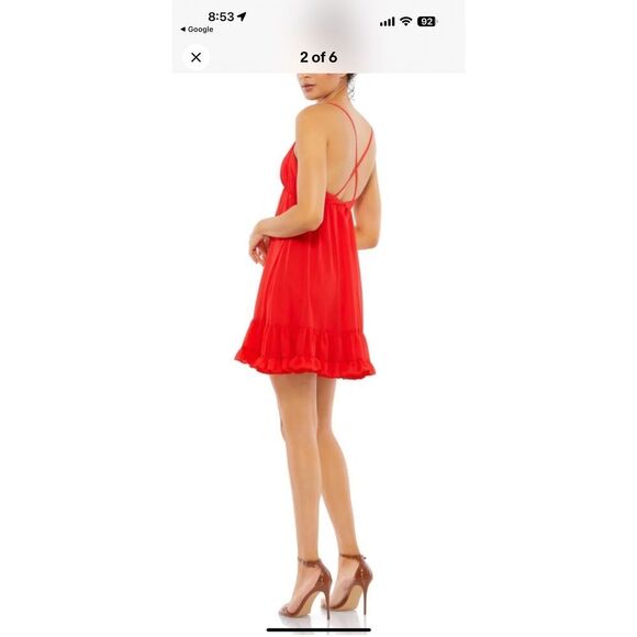 Spaghetti strap chiffon baby doll dress with a v-neckline, crisscross back, and - Picture 2 of 10